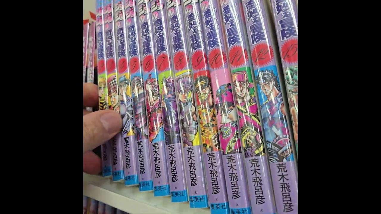 JoJo’s Bizarre Adventure magna selections within book store. Akihabara.  Electric town Tokyo Japan.